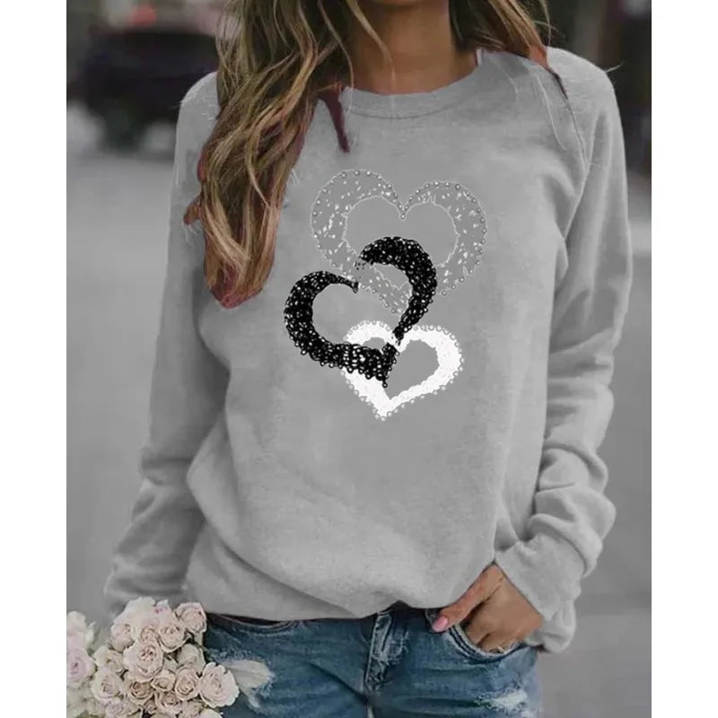 Hoodie Clara™ | Women's Casual Hoodie | Round Neck, Santa Claus Print, Cozy Streetwear for Autumn & Winter